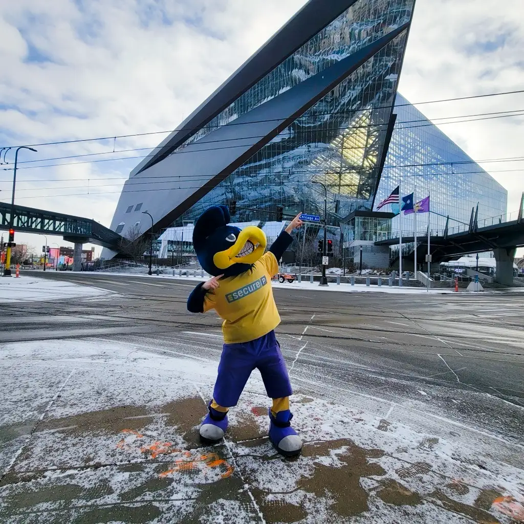 Secure Parking USA's mascot "Nosey" directing event traffic at US Bank Stadium in Downtown Minneapolis